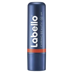 LABELLO CARING BEAUTY CORAL SÄVYTTÄVÄ VOIDE HUULILLE JA POSKILL